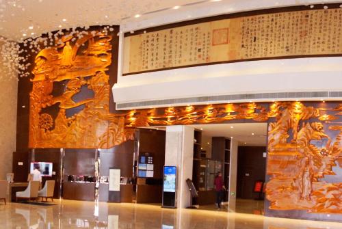 Imagen general del Hotel Howard Johnson Xiangyu Plaza Linyi. Foto 2