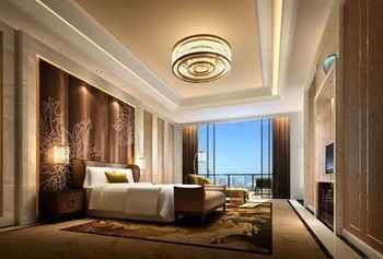 Imagen de la habitación del Hotel Howard Johnson Xiushan Plaza Chongqing. Foto 1