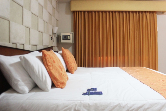 Imagen de la habitación del Hotel Howard Johnson by Wyndham Barranquilla Versalles. Foto 12