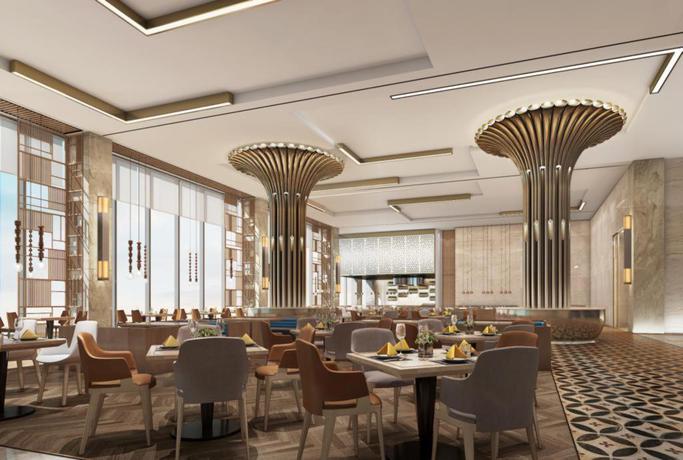 Imagen del bar/restaurante del Hotel Howard Johnson by Wyndham Caexpo Plaza Nanning. Foto 2