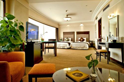 Imagen de la habitación del Hotel Howard Johnson by Wyndham Ginwa Plaza Hotel Xian. Foto 7