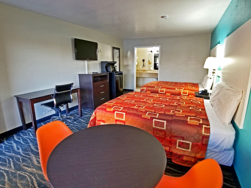 Imagen de la habitación del Hotel Howard Johnson by Wyndham Houston Hobby Airport. Foto 11