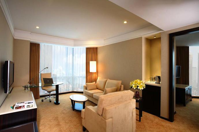Imagen de la habitación del Hotel Howard Johnson by Wyndham Huaihai Hotel Shanghai. Foto 7