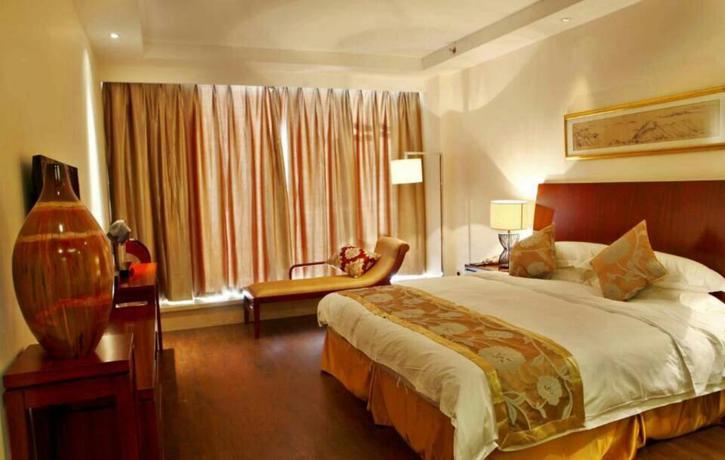 Imagen de la habitación del Hotel Howard Johnson by Wyndham Huaihai Resort Lushan. Foto 14