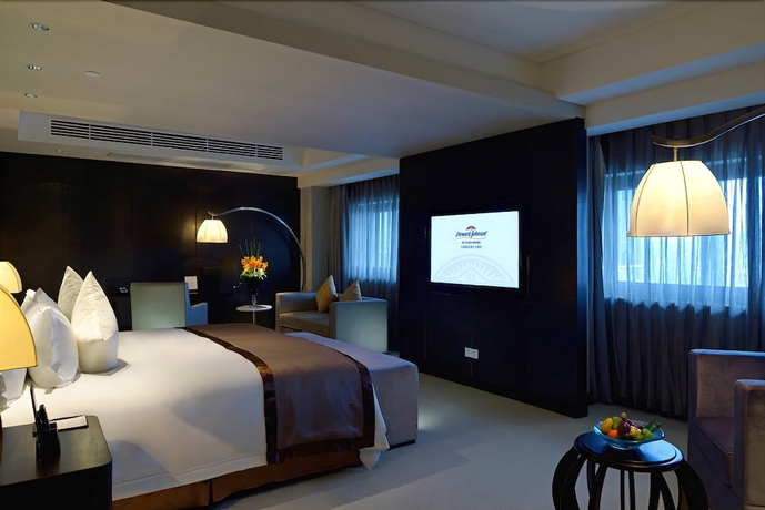 Imagen de la habitación del Hotel Howard Johnson by Wyndham IFC Plaza Ningbo. Foto 6