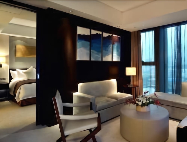 Imagen de la habitación del Hotel Howard Johnson by Wyndham IFC Plaza Ningbo. Foto 11