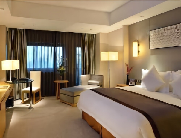 Imagen de la habitación del Hotel Howard Johnson by Wyndham IFC Plaza Ningbo. Foto 12