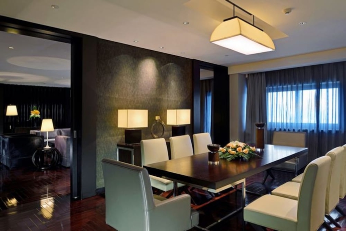 Imagen de la habitación del Hotel Howard Johnson by Wyndham IFC Plaza Ningbo. Foto 13