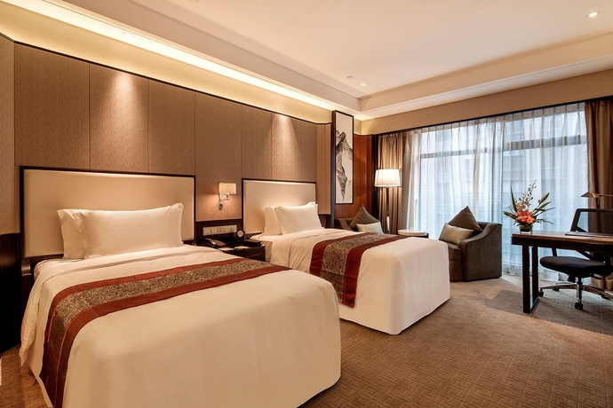 Imagen de la habitación del Hotel Howard Johnson by Wyndham Jinyi Hotel Chongqing. Foto 13