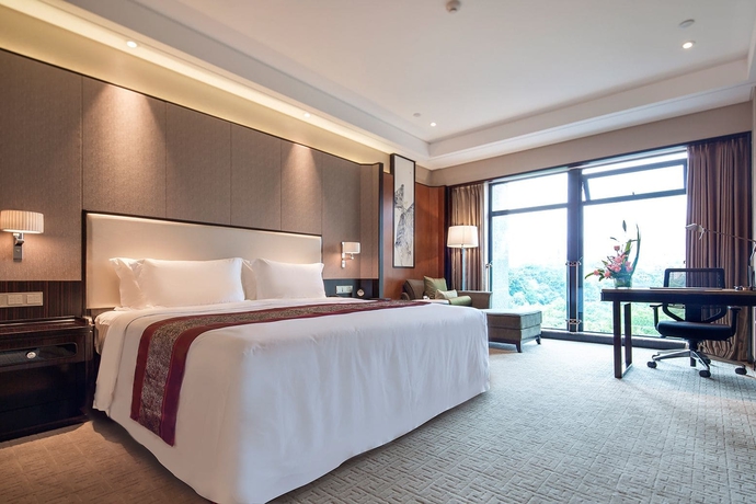 Imagen de la habitación del Hotel Howard Johnson by Wyndham Jinyi Hotel Chongqing. Foto 15