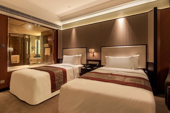 Imagen de la habitación del Hotel Howard Johnson by Wyndham Jinyi Hotel Chongqing. Foto 16