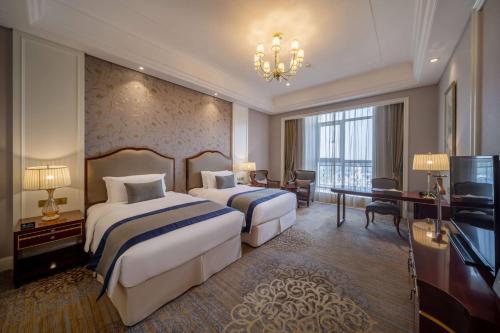 Imagen de la habitación del Hotel Howard Johnson by Wyndham Junhe Hot Springs Resort Beijing. Foto 6