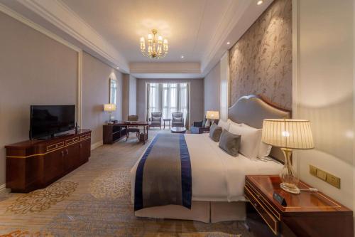 Imagen de la habitación del Hotel Howard Johnson by Wyndham Junhe Hot Springs Resort Beijing. Foto 8