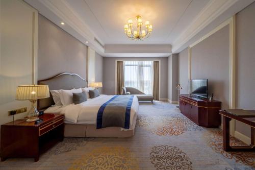 Imagen de la habitación del Hotel Howard Johnson by Wyndham Junhe Hot Springs Resort Beijing. Foto 13