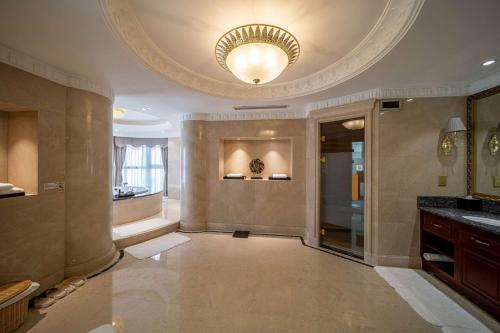 Imagen de la habitación del Hotel Howard Johnson by Wyndham Junhe Hot Springs Resort Beijing. Foto 20