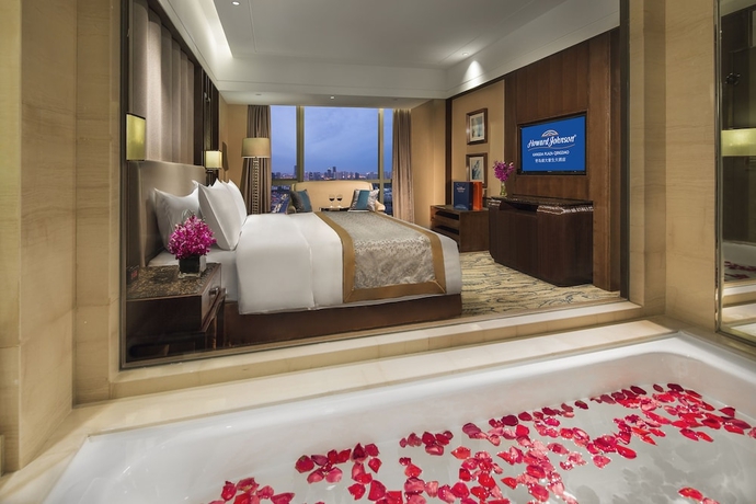 Imagen de la habitación del Hotel Howard Johnson by Wyndham Kangda Plaza Qingdao. Foto 10