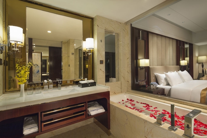 Imagen de la habitación del Hotel Howard Johnson by Wyndham Kangda Plaza Qingdao. Foto 12