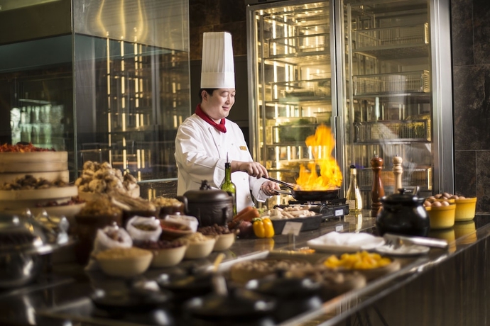 Imagen del bar/restaurante del Hotel Howard Johnson by Wyndham Kangda Plaza Qingdao. Foto 3