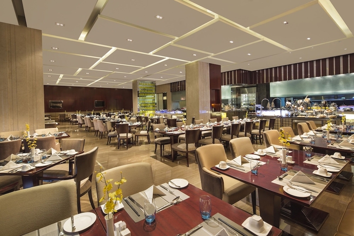 Imagen del bar/restaurante del Hotel Howard Johnson by Wyndham Kangda Plaza Qingdao. Foto 4