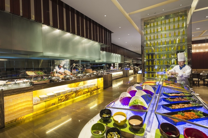 Imagen del bar/restaurante del Hotel Howard Johnson by Wyndham Kangda Plaza Qingdao. Foto 5