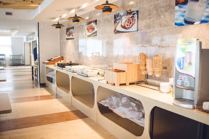 Imagen del bar/restaurante del Hotel Howard Johnson by Wyndham Life Changrong. Foto 3