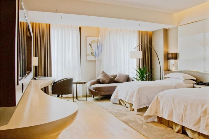 Imagen de la habitación del Hotel Howard Johnson by Wyndham Life Geckor Zhuzhou. Foto 6