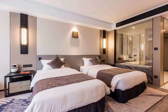 Imagen de la habitación del Hotel Howard Johnson by Wyndham Life ZhuoYuan Ningbo. Foto 6