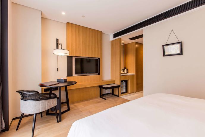 Imagen de la habitación del Hotel Howard Johnson by Wyndham Life ZhuoYuan Ningbo. Foto 8
