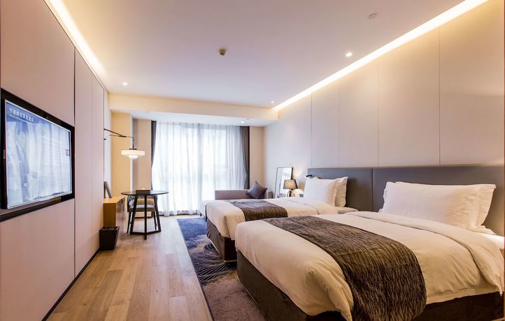 Imagen de la habitación del Hotel Howard Johnson by Wyndham Life ZhuoYuan Ningbo. Foto 10