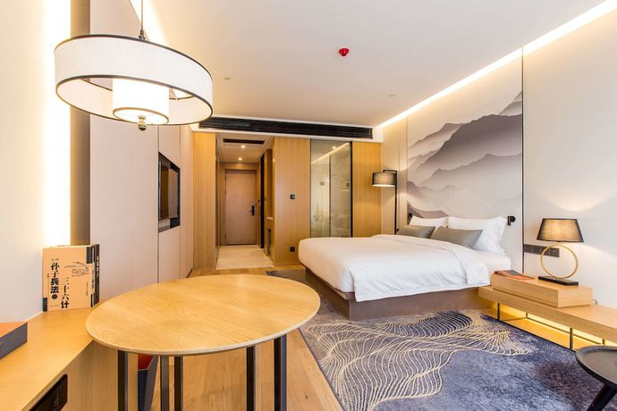Imagen de la habitación del Hotel Howard Johnson by Wyndham Life ZhuoYuan Ningbo. Foto 12