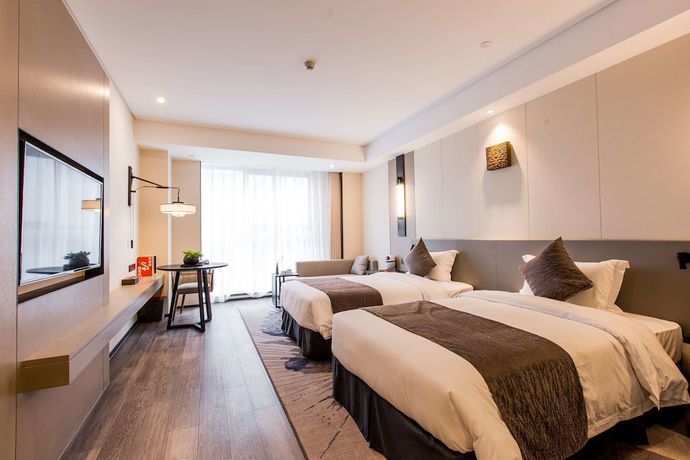Imagen de la habitación del Hotel Howard Johnson by Wyndham Life ZhuoYuan Ningbo. Foto 17