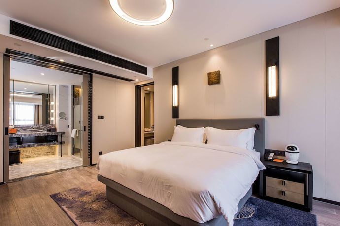 Imagen de la habitación del Hotel Howard Johnson by Wyndham Life ZhuoYuan Ningbo. Foto 18
