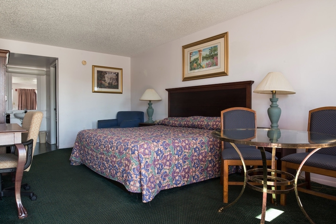 Imagen de la habitación del Hotel Howard Johnson by Wyndham Orlando Lake Buena Vista South. Foto 16