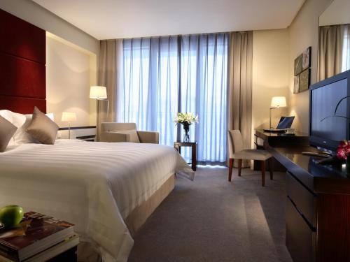 Imagen de la habitación del Hotel Howard Johnson by Wyndham Parkland Hotel Dalian. Foto 15