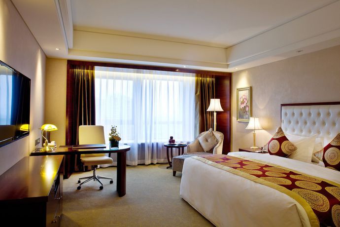 Imagen de la habitación del Hotel Howard Johnson by Wyndham Parkview Plaza Erdos. Foto 11