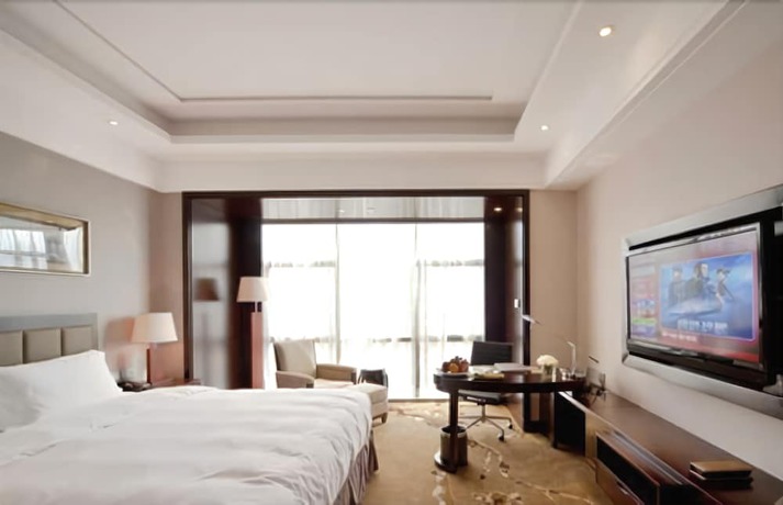 Imagen de la habitación del Hotel Howard Johnson by Wyndham Shipu Plaza Ningbo. Foto 13