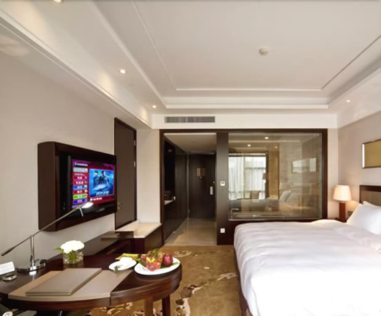 Imagen del bar/restaurante del Hotel Howard Johnson by Wyndham Shipu Plaza Ningbo. Foto 8