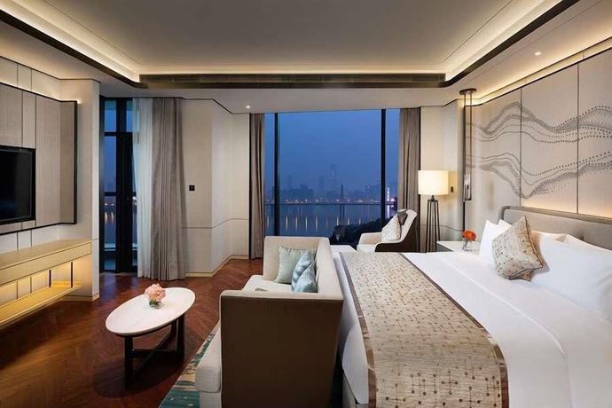 Imagen de la habitación del Hotel Howard Johnson by Wyndham Yacht Club Hotel Changsha. Foto 11