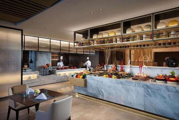 Imagen del bar/restaurante del Hotel Howard Johnson by Wyndham Yacht Club Hotel Changsha. Foto 4