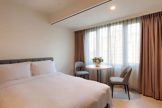 Imagen de la habitación del Hotel Howard Plaza Hsinchu. Foto 9