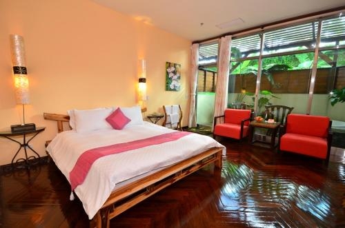 Imagen de la habitación del Hotel Howard Villa. Foto 8