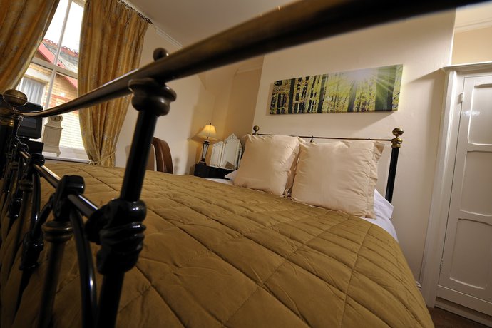 Imagen de la habitación del Hotel Howarth House Apartments. Foto 12