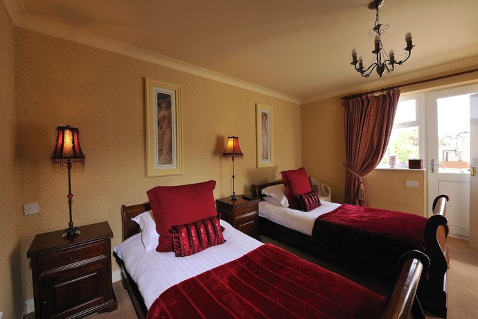 Imagen de la habitación del Hotel Howarth House. Foto 12