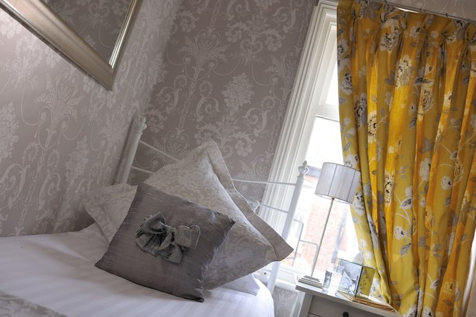 Imagen de la habitación del Hotel Howarth House. Foto 14