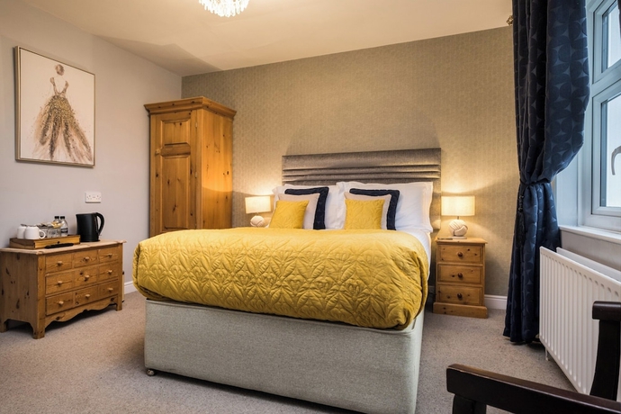 Imagen de la habitación del Hotel Howbeck Guest House. Foto 2