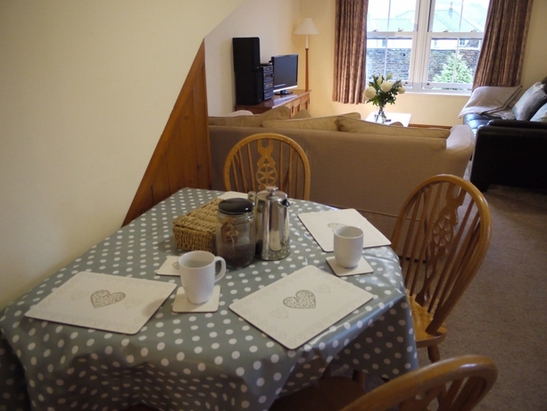 Imagen del bar/restaurante del Hotel Howgills Apartments. Foto 4