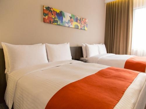 Imagen de la habitación del Hotel Hoya Resort Kaohsiung. Foto 6