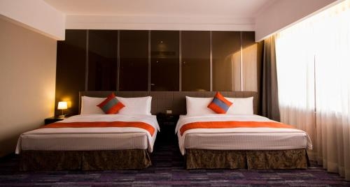 Imagen de la habitación del Hotel Hoya Resort Kaohsiung. Foto 8