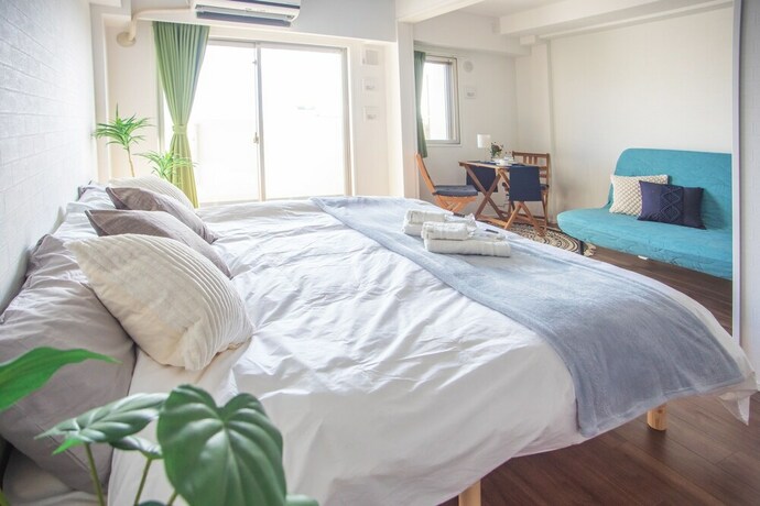 Imagen de la habitación del Hotel Hoyou Suite Residence Osaka Ashiharabashi Station Front. Foto 13