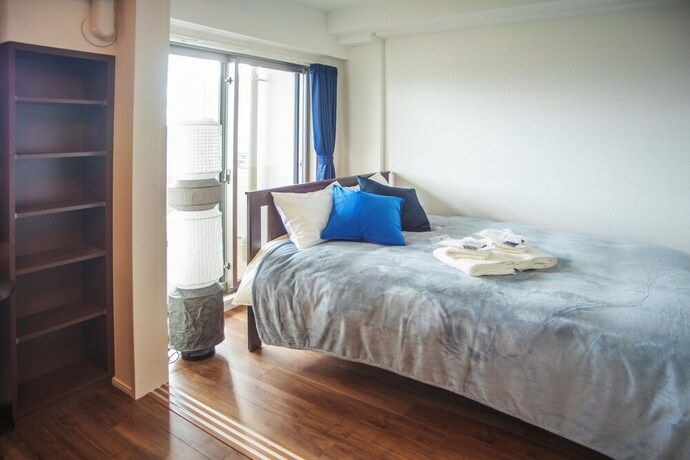 Imagen de la habitación del Hotel Hoyou Suite Residence Osaka Ashiharabashi Station Front. Foto 23